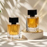 Vente en gros de flacons de parfum en verre transparent carré de haute qualité avec couvercle en plastique ABS 30ml 50ml 100ml Flacon de parfum avec boîte d'emballage