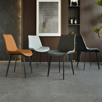 Chaise de salle à manger minimaliste italienne pour la maison, en métal de haute qualité, avec revêtement en cuir noir, dossier de luxe léger