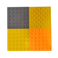 Carreaux de pavage tactiles en caoutchouc PVC TPU auto-adhésifs de haute qualité bandes indicatrices circulaires pour carreau de pavage tactile de tapis de route aveugle