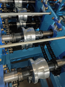 เครื่องขึ้นรูปประตูม้วนโลหะอัตโนมัติพร้อมมอเตอร์ ลูกปืน และชิ้นส่วนแกนเกียร์ ราคาโรงงาน - Product Image 5