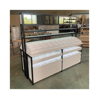 Vitrine en bois robuste et étanche avec éclairage LED personnalisé pour la vente au détail de lunettes de soleil, bijoux, téléphones, optiques, mobilier de magasin