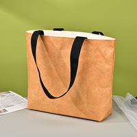 Sac fourre-tout en papier écologique étanche Dupont Tyvek Sac à bandoulière léger Logo personnalisé Lumière de luxe pour Shopping Travail Quotidien Extérieur