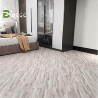 Feuerfester, feuchtigkeitsbeständiger Walnussgrauer 4/5/6/7mm PVC SPC Holzboden Klicksystem für Wohnzimmer, Büros, Hotels - Grafikdesign