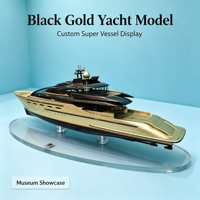 Modèle de yacht de luxe noir et or personnalisé avec coque dorée, superstructure noire et ligne d'eau colorée