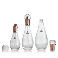 Botol Kemasan Kosmetik Kaca Transparan Bentuk Bowling 60ml 100ml Kosong dengan Tutup Emas Mawar