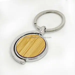 Bluk customize blank plain wooden keyrings your own logo rotating wood keychains wholesale personalised wooden keyrings