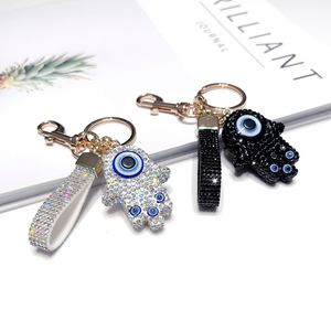 Porte-clés Hamsa et Œil protecteur entièrement orné de strass, en forme de main, avec breloque de sac en alliage métallique et bracelet de poignet en PU, style mode et luxe, pour clés de voiture - Product Image 3