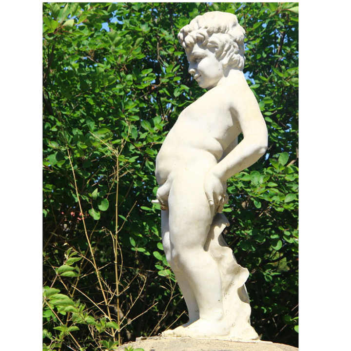 boy outside pissing 