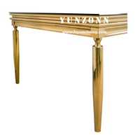 Table à manger moderne en verre à cadre doré avec long design rectangulaire Réception de mariage Hôtels en plein air Fêtes de salon