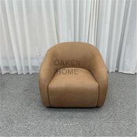 Fauteuil d'appoint en cuir OAKEN moderne, incurvé et pivotant, fauteuil barillet rembourré, canapé de salon individuel pour la détente
