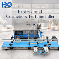 Machine de remplissage automatique de liquides à double tête magnétique de haute précision avec contrôle numérique pour les boutiques de cosmétiques et de parfums