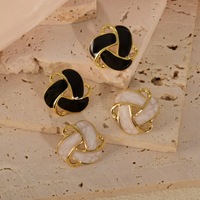 Pendientes de estilo palaciego retro, geométricos triangulares con esmalte de goteo, de moda, con diseño de flor hueca giratoria, al por mayor