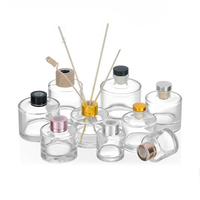 Vente en gros de bouteille diffuseur ronde de luxe personnalisée de 100ml 200ml bouteille vide en verre diffuseur d'anche avec couvercles