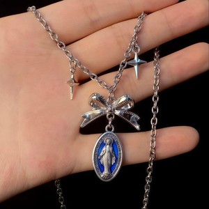Collar con colgante ovalado de lazo a la moda con dijes de estrella, chapado en plata para mujer, cadena para clavícula, estilo retro, combina con todo - Product Image 1