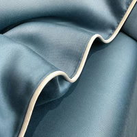 Couette d'été de luxe légère et personnalisée en gros, literie douce 4 pièces brodée en soie de glace géométrique lavable en machine