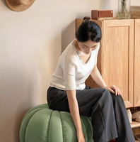 Pouf rond bas moderne en cuir couleur citrouille, repose-pieds pour canapé, pour salon, chambre, décoration intérieure et usage hôtelier