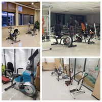 Vélo d'exercice stationnaire électrique pour la rééducation des membres supérieurs et inférieurs, idéal pour l'hémiplégie post-AVC et l'entraînement des jambes.