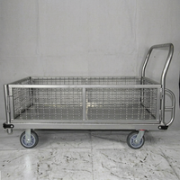 Chariot pliable et portable en acier robuste à quatre roues avec clôture grillagée pour le transport de marchandises en entrepôt et la livraison logistique