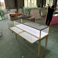 Vitrine de présentation de bijoux en acier inoxydable de luxe, en MDF, avec éclairage, pour comptoir de magasin et salle d'exposition