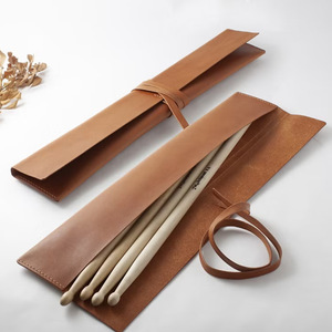 Paquete de dos baquetas con cubiertas de cuero (mismo estilo que las utilizadas en el comercio electrónico transfronterizo), bolsa de almacenamiento para baquetas - Product Image 1