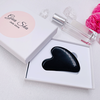 Planche de massage Gua Sha en quartz rose et jade, très vendue en 2022