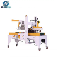 Machine à sceller les cartons entièrement automatique et réglable électriquement avec certification CE pour l'emballage des vêtements et des boissons