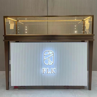 Vitrine de présentation de bijoux de luxe, en acier inoxydable, cadre plaqué titane, verre trempé transparent pour centre commercial