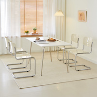 Chaise flottante minimaliste nordique Design créatif en métal pour salle à manger et salon pour bureau loisirs inspiré tabouret de magasin de thé au lait