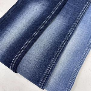 Tessuto Denim Blu Scuro in Twill Incrociato 52% Cotone 35% Poliestere 11% Viscosa 2% Spandex 379gsm 180cm - Product Image 1