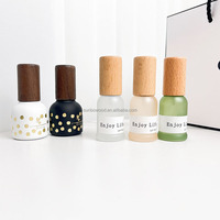 Botella personalizada tapa redonda de madera para perfume bola redonda de alta calidad tapa de madera fabricante de tapas de Bambú