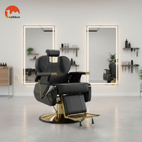 Fauteuil de barbier moderne en similicuir confortable avec structure métallique, noir et or, pivotant, pour salon de coiffure