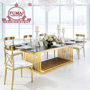 โต๊ะรับประทานอาหารกลางแจ้งทรงสี่เหลี่ยมผืนผ้ากระจก โมเดิร์น ยี่ห้อ Fumai รุ่น MG-205 โครงเหล็กกล้าไร้สนิมเคลือบทอง จาก Foshan Hotel Furniture - Product Image 2