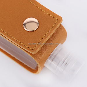 WD Factory Price Tassel Charm Disinfection <strong>Empty</strong> Bottle Hand Sanitizer Pu Leather Holder <strong>Keychain</strong> With Lobster Clip