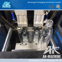 Máquina de Moldeo por Extrusión y Soplado Semiautomática de Múltiples Cavidades para Botellas de PET/PC/PE, Controlada por PLC, Alta Productividad