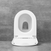 WC suspendu mural rond à réservoir encastré, céramique sans rebord, vente en gros directe usine pour projets hôteliers