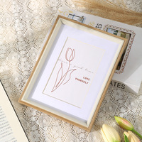Nueva llegada regalos de estilo europeo de escritorio minimalista decoración del hogar cuadro de mesa hueco foto Marco de resina