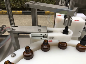 เครื่องบรรจุขวดแบบโรตารี่อัตโนมัติ พร้อมฝาปิดและติดฉลาก ขนาด 15 มล. 30 มล. 1 ออนซ์ 2 ออนซ์ สำหรับบรรจุน้ำ<span class=keywords><strong>มัน</strong></span>หอมระเหยและทิงเจอร์ - Product Image 3