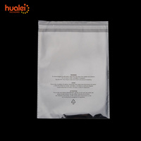 Kustom plastik plastik kemasan Polybag tas poli bening dengan peringatan kekurangan untuk kemasan pakaian T shirt