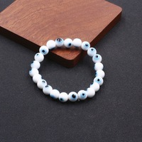 Nouveautés Bracelet en perles œil de diable en acrylique Bijoux unisexe Bracelet ajustable en résine colorée avec perles œil maléfique pour fille