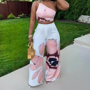 ชุดเซ็ต 2 ชิ้น เสื้อเปิดไหล่ข้างเดียวพิมพ์ลาย กางเกงขายาวทรงหลวม สไตล์ลำลอง แฟชั่นสำหรับผู้หญิง - Product Image 1