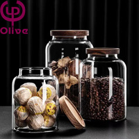 Grand bocal de rangement en verre étanche à l'humidité en bois d'acacia avec couvercle pour l'emballage des aliments et du thé.