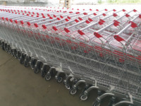 DIKA DK-E-180L Chariot de courses pliable en acier robuste pour supermarché avec roues élévatrices et siège, protection anticorrosion zinguée