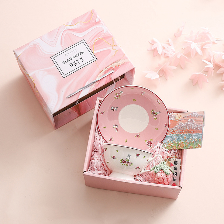 Cup and saucer, card, keychain