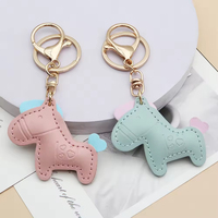 Porte-clés en cuir de cheval en gros, nouveau design, mignon Pégase, en cuir gaufré, durable, breloques de sac de luxe
