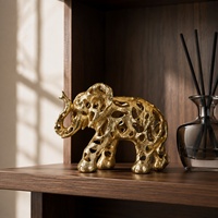 Figurine d'éléphant ajourée en résine dorée, petite sculpture animale moderne pour table, idéale pour le salon, le bureau et la décoration de maison.