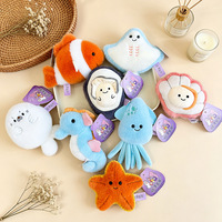 En gros : Poupées en peluche, autocollants pour réfrigérateur, figurines de desserts et figurines pour machine à griffes, de la série météo magnétique océanique (nuage, étoile, phoque, coquille Saint-Jacques)