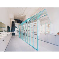 Présentoir optique fonctionnel de vitrine d'affichage de lunettes de stratifié de verre de conception de magasin optique professionnel