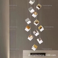 Lustre LED design en acier inoxydable et verre avec abat-jour en forme de glaçon pour escalier de bâtiment à deux étages, restaurant, comptoir de bar, doré