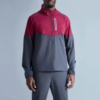 Survêtement 100% polyester coupe-vent imperméable avec empiècements en maille respirante extensible dans les quatre sens et poches réfléchissantes