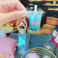Vente en gros de porte-clés tasse à thé au lait perlé Porte-clés liquide Boba ours Porte-clés Boba flottant
